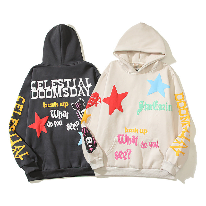 Two hoodies, one black and one beige, with colorful text and star designs on a white background.